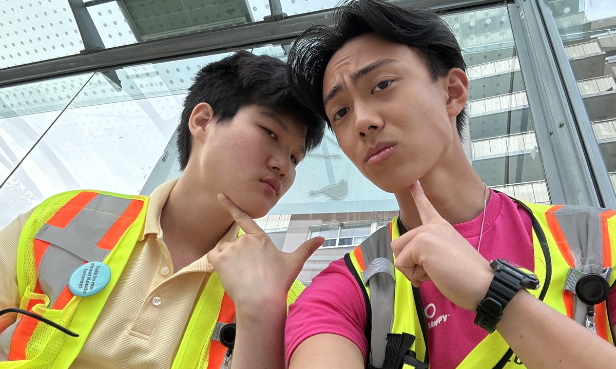 Ethan and a coworker in Koodo safety vests during the Go Sales summer, June 2024